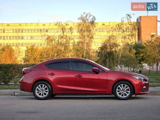 Красный Мазда 3, объемом двигателя 2 л и пробегом 89 тыс. км за 11000 $, фото 3 на Automoto.ua