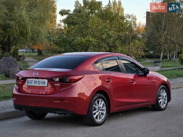 Красный Мазда 3, объемом двигателя 2 л и пробегом 89 тыс. км за 11000 $, фото 6 на Automoto.ua