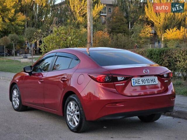 Красный Мазда 3, объемом двигателя 2 л и пробегом 89 тыс. км за 11000 $, фото 9 на Automoto.ua