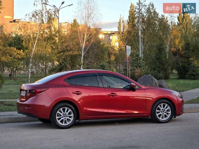 Красный Мазда 3, объемом двигателя 2 л и пробегом 89 тыс. км за 11000 $, фото 4 на Automoto.ua