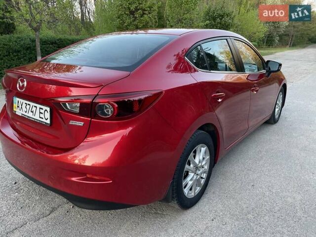 Красный Мазда 3, объемом двигателя 1.5 л и пробегом 95 тыс. км за 13300 $, фото 59 на Automoto.ua