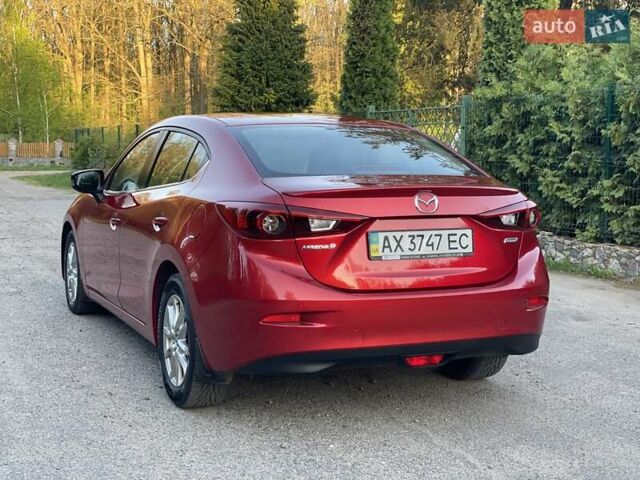 Красный Мазда 3, объемом двигателя 1.5 л и пробегом 95 тыс. км за 13300 $, фото 12 на Automoto.ua