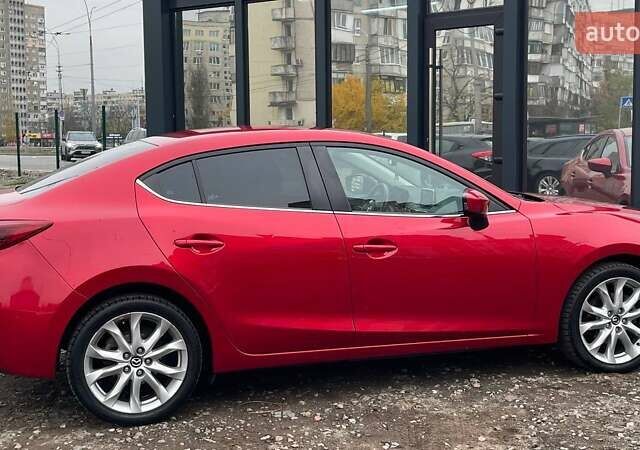 Красный Мазда 3, объемом двигателя 2.49 л и пробегом 172 тыс. км за 11990 $, фото 5 на Automoto.ua