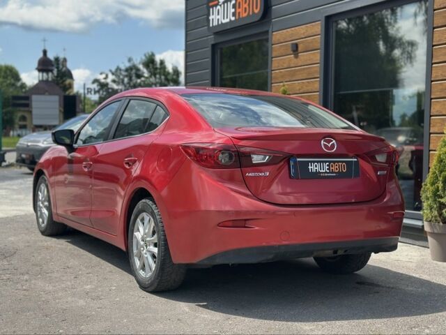 Красный Мазда 3, объемом двигателя 2 л и пробегом 128 тыс. км за 9500 $, фото 5 на Automoto.ua