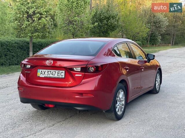 Красный Мазда 3, объемом двигателя 1.5 л и пробегом 95 тыс. км за 13300 $, фото 15 на Automoto.ua