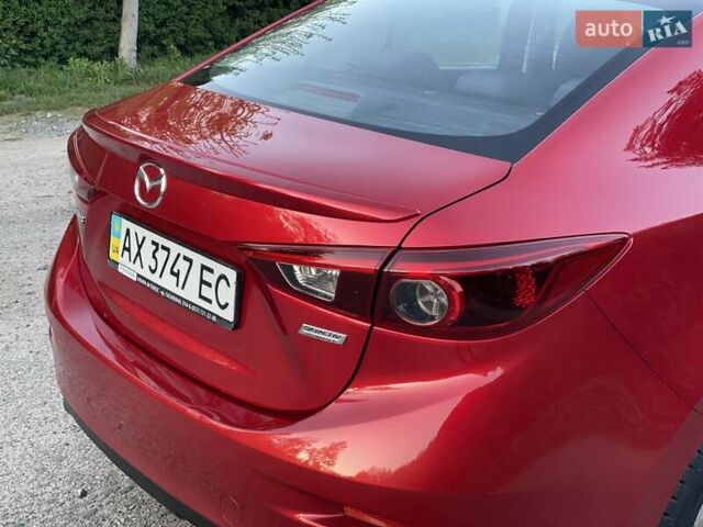 Красный Мазда 3, объемом двигателя 1.5 л и пробегом 95 тыс. км за 13300 $, фото 56 на Automoto.ua