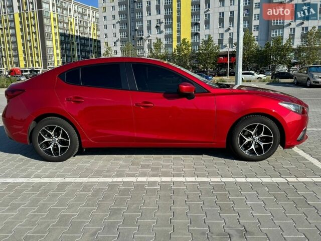 Красный Мазда 3, объемом двигателя 2 л и пробегом 205 тыс. км за 9400 $, фото 8 на Automoto.ua