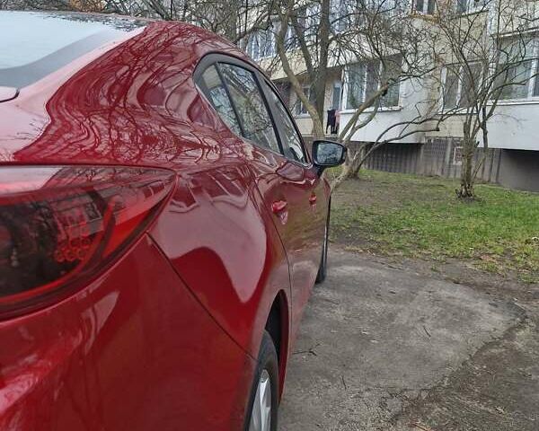 Красный Мазда 3, объемом двигателя 1.5 л и пробегом 53 тыс. км за 12500 $, фото 7 на Automoto.ua