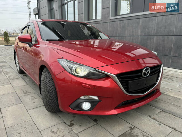 Красный Мазда 3, объемом двигателя 1.5 л и пробегом 140 тыс. км за 13950 $, фото 1 на Automoto.ua