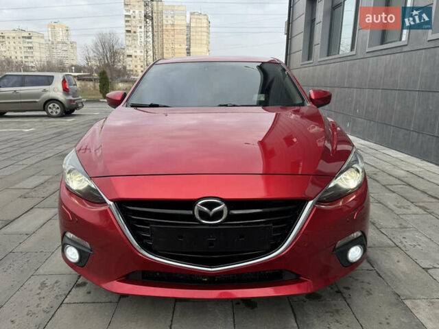 Красный Мазда 3, объемом двигателя 1.5 л и пробегом 140 тыс. км за 13950 $, фото 2 на Automoto.ua