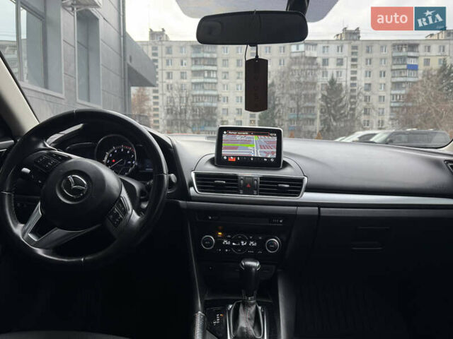 Красный Мазда 3, объемом двигателя 1.5 л и пробегом 140 тыс. км за 13950 $, фото 10 на Automoto.ua