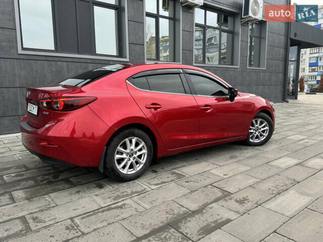 Красный Мазда 3, объемом двигателя 1.5 л и пробегом 140 тыс. км за 13950 $, фото 6 на Automoto.ua