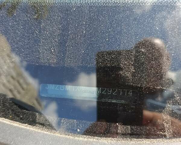 Красный Мазда 3, объемом двигателя 2 л и пробегом 135 тыс. км за 12800 $, фото 16 на Automoto.ua