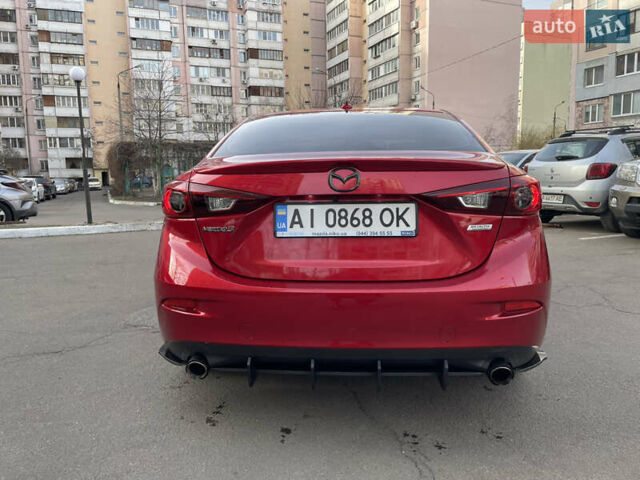 Красный Мазда 3, объемом двигателя 2 л и пробегом 163 тыс. км за 12500 $, фото 4 на Automoto.ua