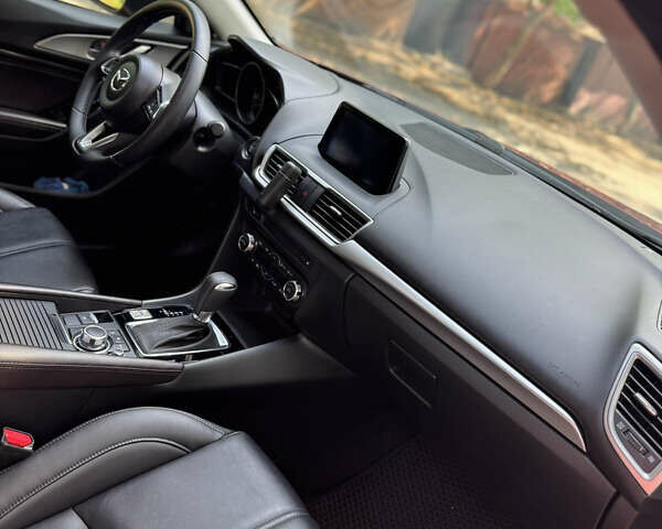 Червоний Мазда 3, об'ємом двигуна 2 л та пробігом 90 тис. км за 12600 $, фото 24 на Automoto.ua