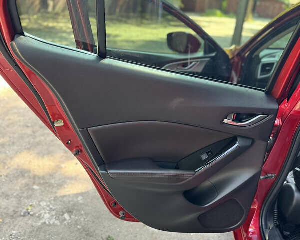 Червоний Мазда 3, об'ємом двигуна 2 л та пробігом 90 тис. км за 12600 $, фото 31 на Automoto.ua