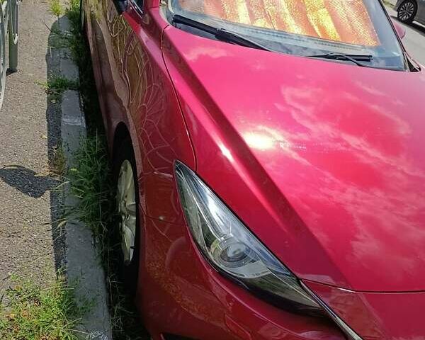 Красный Мазда 3, объемом двигателя 2 л и пробегом 135 тыс. км за 12800 $, фото 2 на Automoto.ua