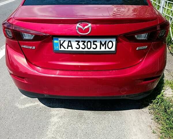Красный Мазда 3, объемом двигателя 2 л и пробегом 135 тыс. км за 12800 $, фото 3 на Automoto.ua