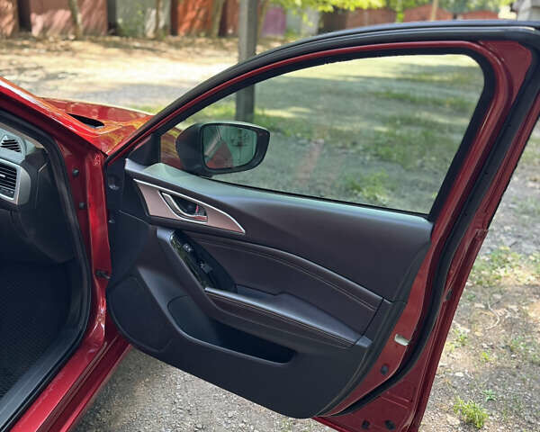 Червоний Мазда 3, об'ємом двигуна 2 л та пробігом 90 тис. км за 12600 $, фото 27 на Automoto.ua