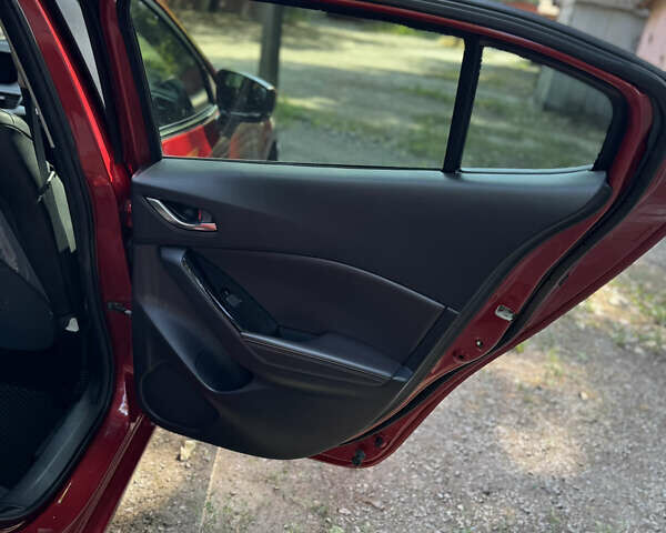 Червоний Мазда 3, об'ємом двигуна 2 л та пробігом 90 тис. км за 12600 $, фото 25 на Automoto.ua