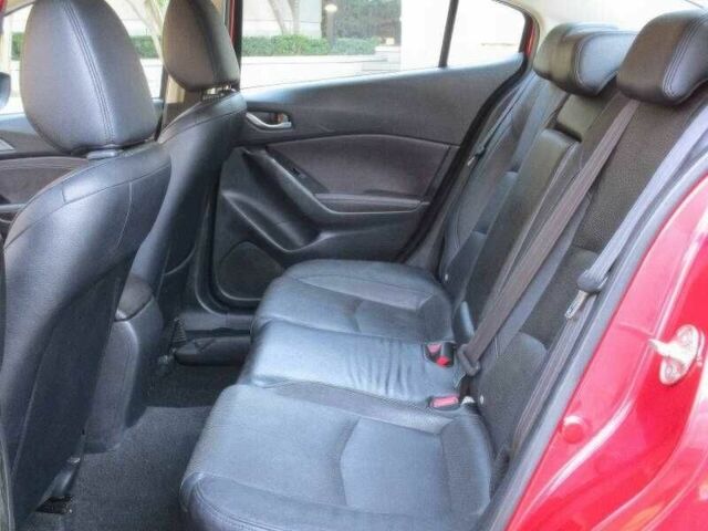 Красный Мазда 3, объемом двигателя 2.5 л и пробегом 98 тыс. км за 8000 $, фото 9 на Automoto.ua