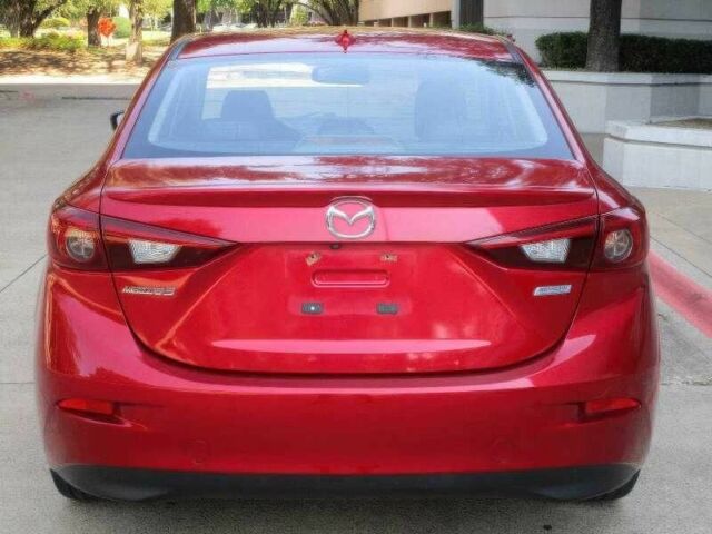 Красный Мазда 3, объемом двигателя 2.5 л и пробегом 98 тыс. км за 8000 $, фото 4 на Automoto.ua