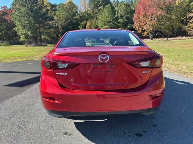 Красный Мазда 3, объемом двигателя 2 л и пробегом 51 тыс. км за 8000 $, фото 4 на Automoto.ua