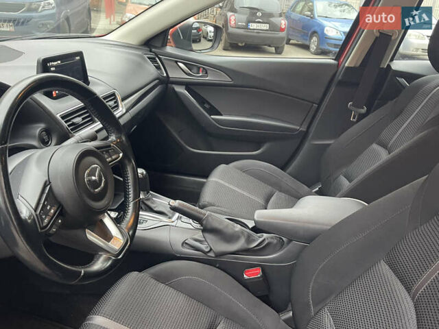 Красный Мазда 3, объемом двигателя 1.5 л и пробегом 125 тыс. км за 13600 $, фото 9 на Automoto.ua