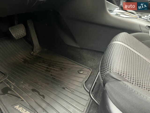 Красный Мазда 3, объемом двигателя 1.5 л и пробегом 125 тыс. км за 13600 $, фото 14 на Automoto.ua