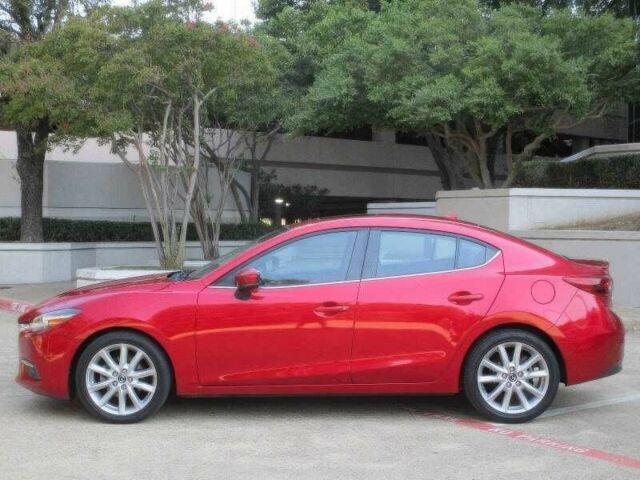 Красный Мазда 3, объемом двигателя 2.5 л и пробегом 98 тыс. км за 8000 $, фото 2 на Automoto.ua