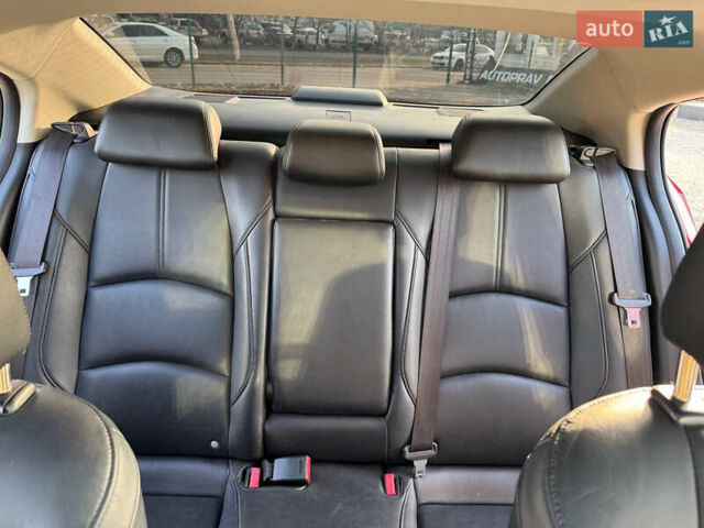 Красный Мазда 3, объемом двигателя 2.5 л и пробегом 100 тыс. км за 13000 $, фото 17 на Automoto.ua