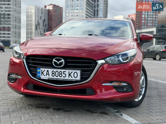 Красный Мазда 3, объемом двигателя 1.5 л и пробегом 56 тыс. км за 15799 $, фото 1 на Automoto.ua