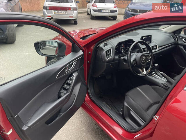 Красный Мазда 3, объемом двигателя 1.5 л и пробегом 125 тыс. км за 13600 $, фото 10 на Automoto.ua
