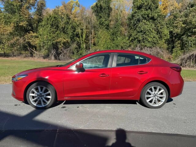 Красный Мазда 3, объемом двигателя 2 л и пробегом 51 тыс. км за 8000 $, фото 2 на Automoto.ua