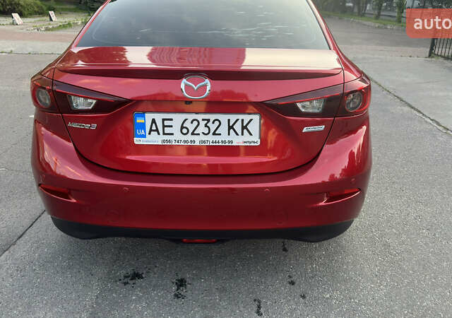 Красный Мазда 3, объемом двигателя 1.5 л и пробегом 130 тыс. км за 15100 $, фото 1 на Automoto.ua