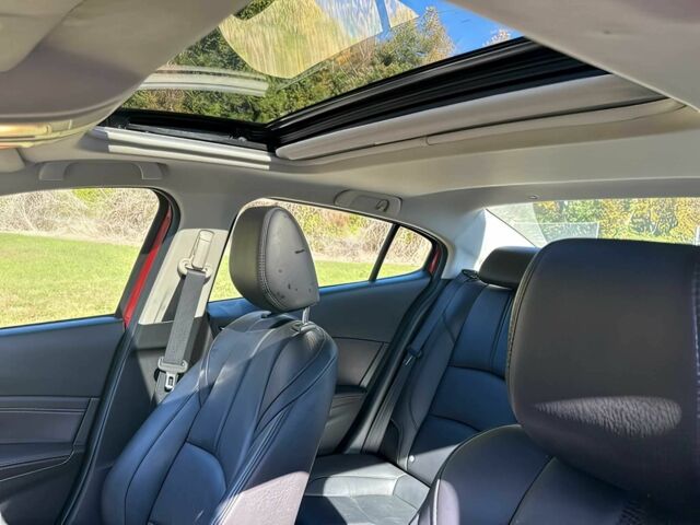 Красный Мазда 3, объемом двигателя 2 л и пробегом 51 тыс. км за 8000 $, фото 9 на Automoto.ua