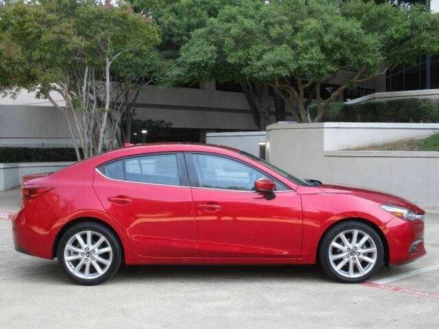 Красный Мазда 3, объемом двигателя 2.5 л и пробегом 98 тыс. км за 8000 $, фото 3 на Automoto.ua