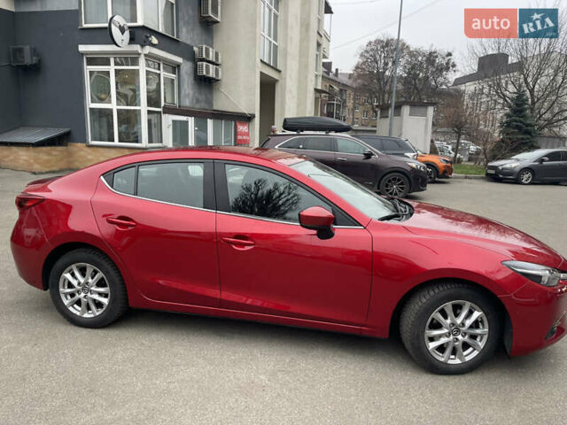 Красный Мазда 3, объемом двигателя 1.5 л и пробегом 125 тыс. км за 13600 $, фото 1 на Automoto.ua