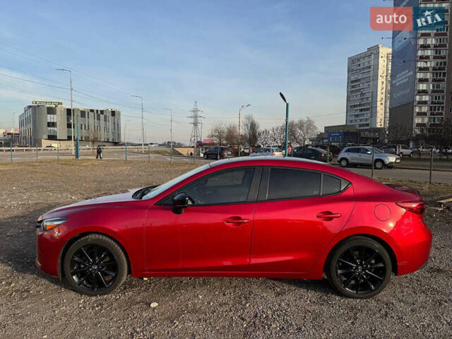 Красный Мазда 3, объемом двигателя 2.5 л и пробегом 100 тыс. км за 13000 $, фото 3 на Automoto.ua