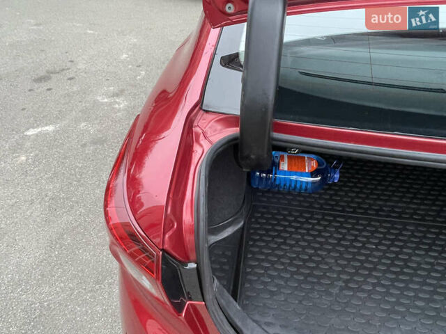 Красный Мазда 3, объемом двигателя 1.5 л и пробегом 125 тыс. км за 13600 $, фото 20 на Automoto.ua