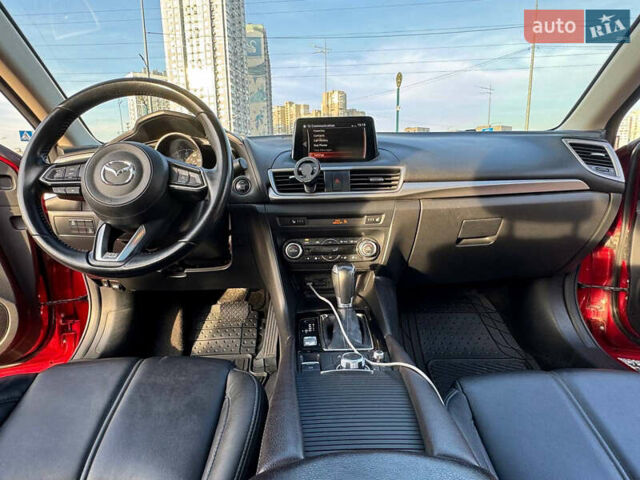 Красный Мазда 3, объемом двигателя 2.5 л и пробегом 100 тыс. км за 13000 $, фото 11 на Automoto.ua