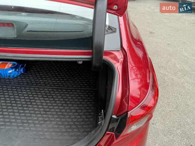 Красный Мазда 3, объемом двигателя 1.5 л и пробегом 125 тыс. км за 13600 $, фото 19 на Automoto.ua