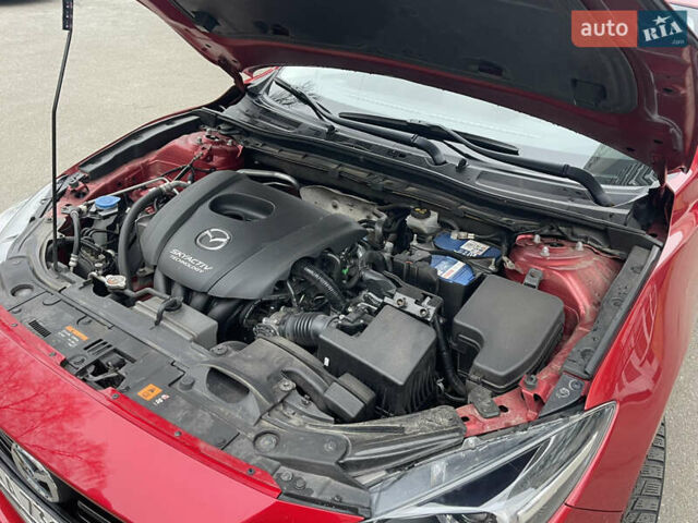 Красный Мазда 3, объемом двигателя 1.5 л и пробегом 125 тыс. км за 13600 $, фото 7 на Automoto.ua