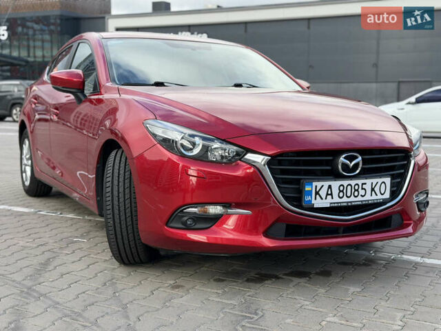 Красный Мазда 3, объемом двигателя 1.5 л и пробегом 56 тыс. км за 15799 $, фото 2 на Automoto.ua