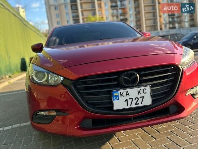 Красный Мазда 3, объемом двигателя 2 л и пробегом 170 тыс. км за 13500 $, фото 1 на Automoto.ua