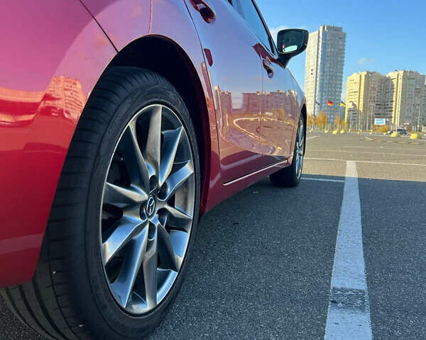 Красный Мазда 3, объемом двигателя 2.5 л и пробегом 83 тыс. км за 15450 $, фото 12 на Automoto.ua