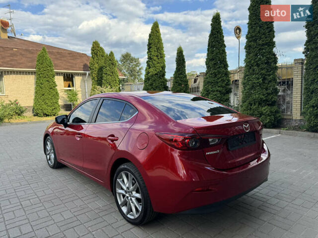 Красный Мазда 3, объемом двигателя 2.5 л и пробегом 180 тыс. км за 13300 $, фото 4 на Automoto.ua