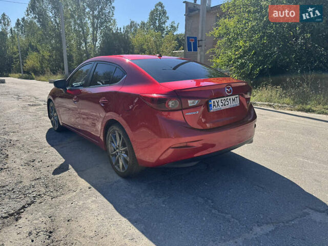Красный Мазда 3, объемом двигателя 2.49 л и пробегом 80 тыс. км за 15500 $, фото 3 на Automoto.ua