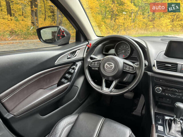 Красный Мазда 3, объемом двигателя 2.5 л и пробегом 180 тыс. км за 13300 $, фото 13 на Automoto.ua
