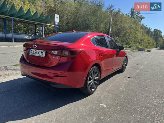 Красный Мазда 3, объемом двигателя 2.49 л и пробегом 80 тыс. км за 15500 $, фото 4 на Automoto.ua